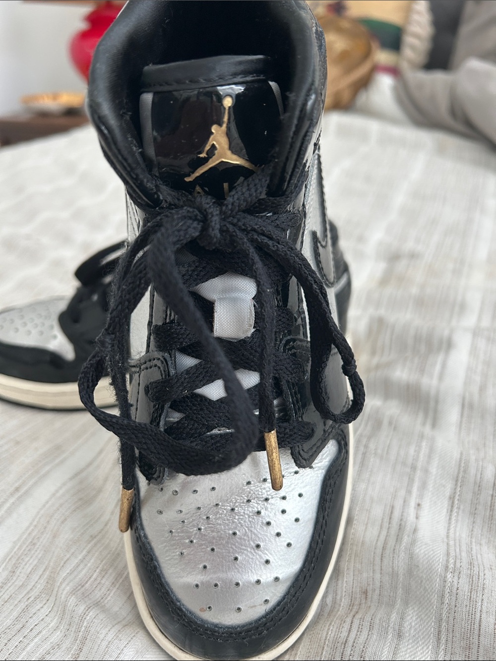 Nike Air Jordan 1 Mid - Black and Silver with Gold Accents